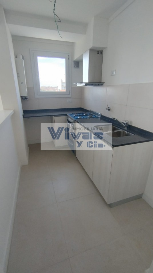 DEPARTAMENTO DOS AMBIENTES A ESTRENAR CON COCHERA